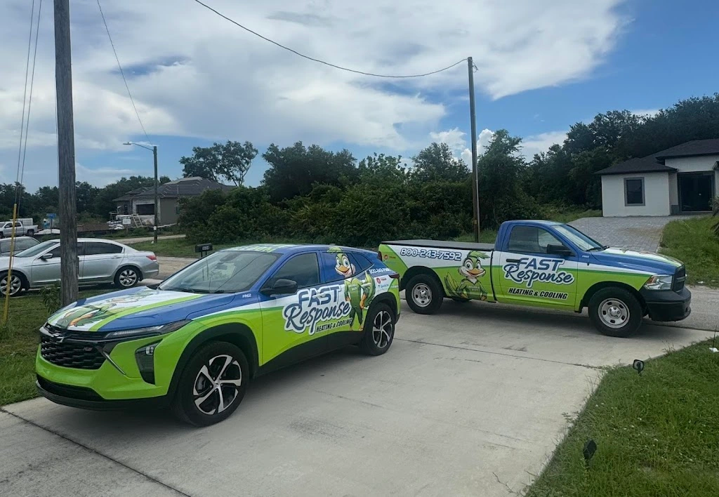 Fast Response Heating and Cooling family-owned service vehicles parked at a Cape Coral, Florida home