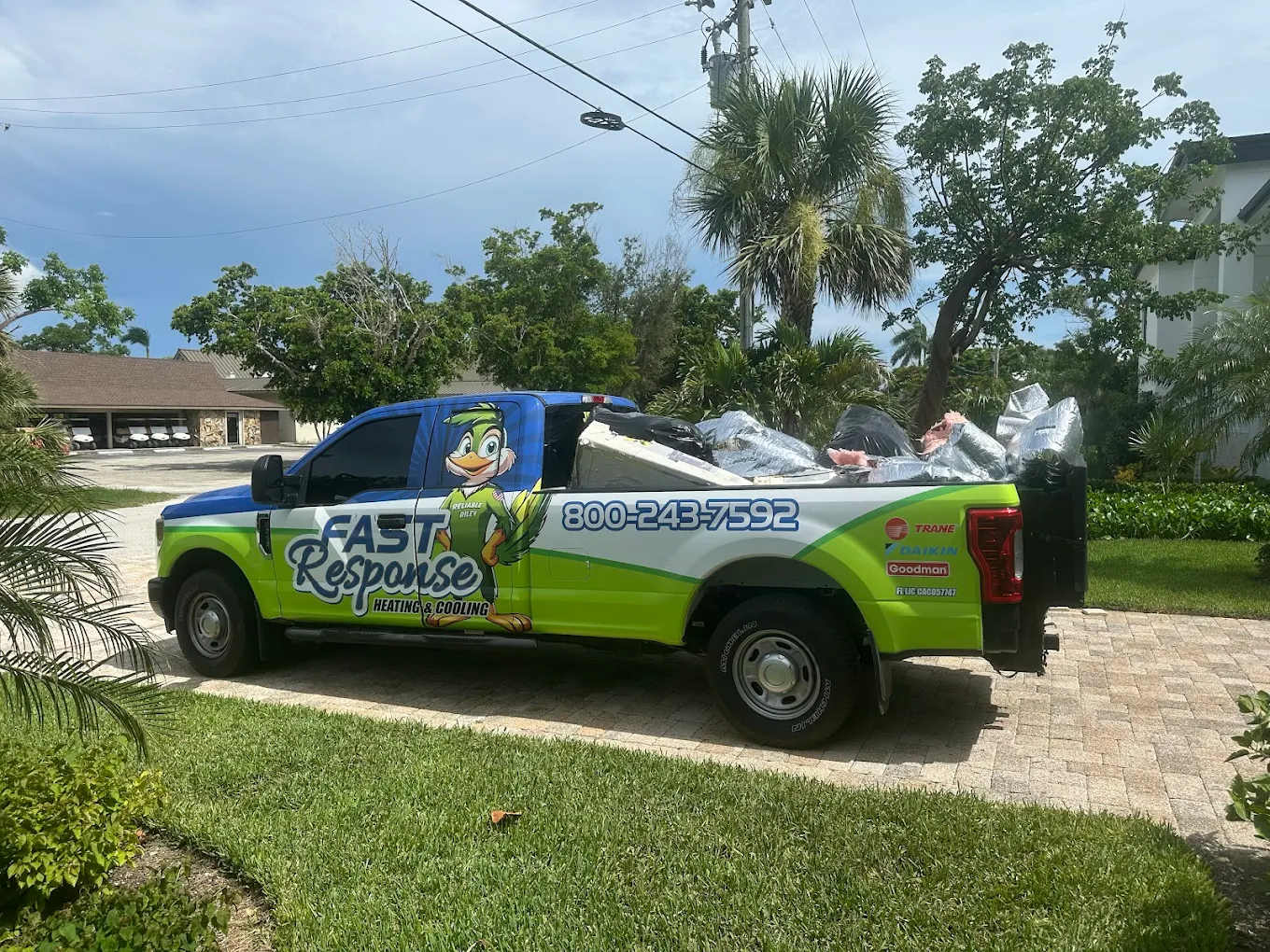 Fast Response Heating & Cooling fully stocked service truck arriving at a Cape Coral, Southwest Florida home