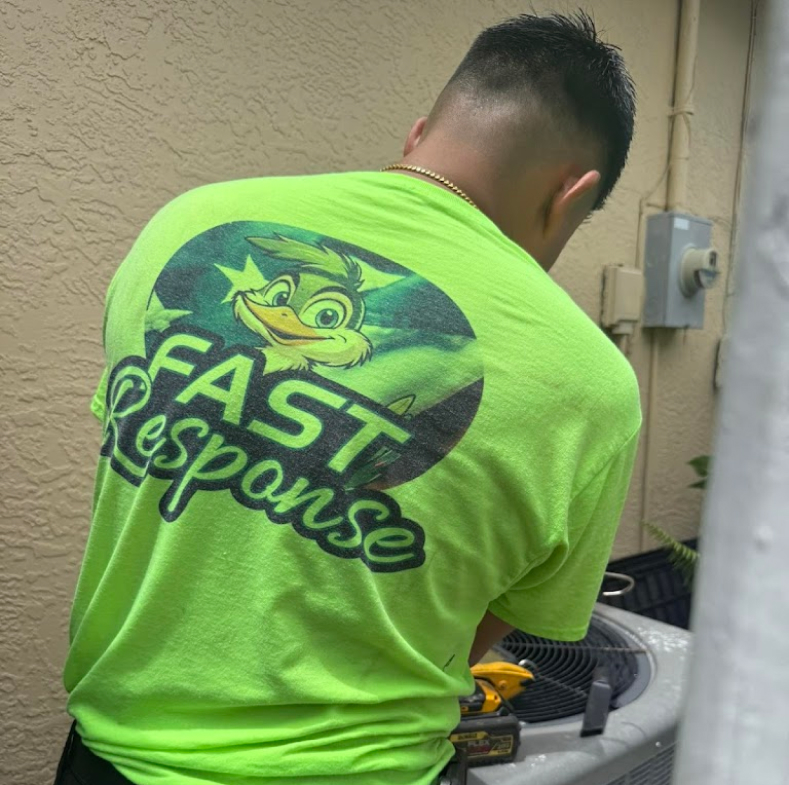 Fast Response HVAC Technician Repairing AC Condenser Unit